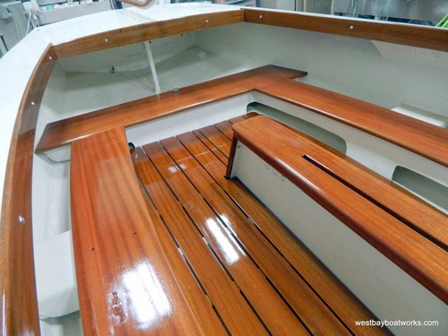 A restored fiberglass runabout at a Northern Michigan boatyard